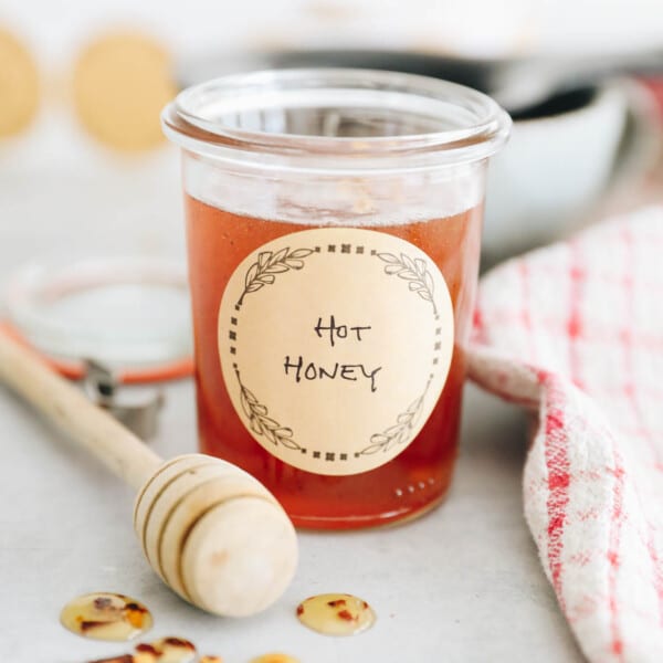hot honey in a small mason jar with a brown label that says "hot honey".